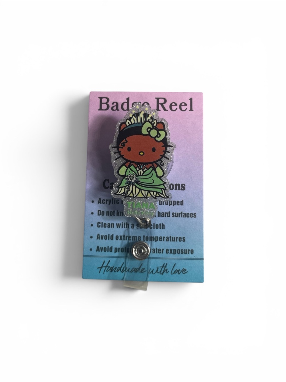 Hello Kitty Princess Tiana Badge Reel - Pink, Green